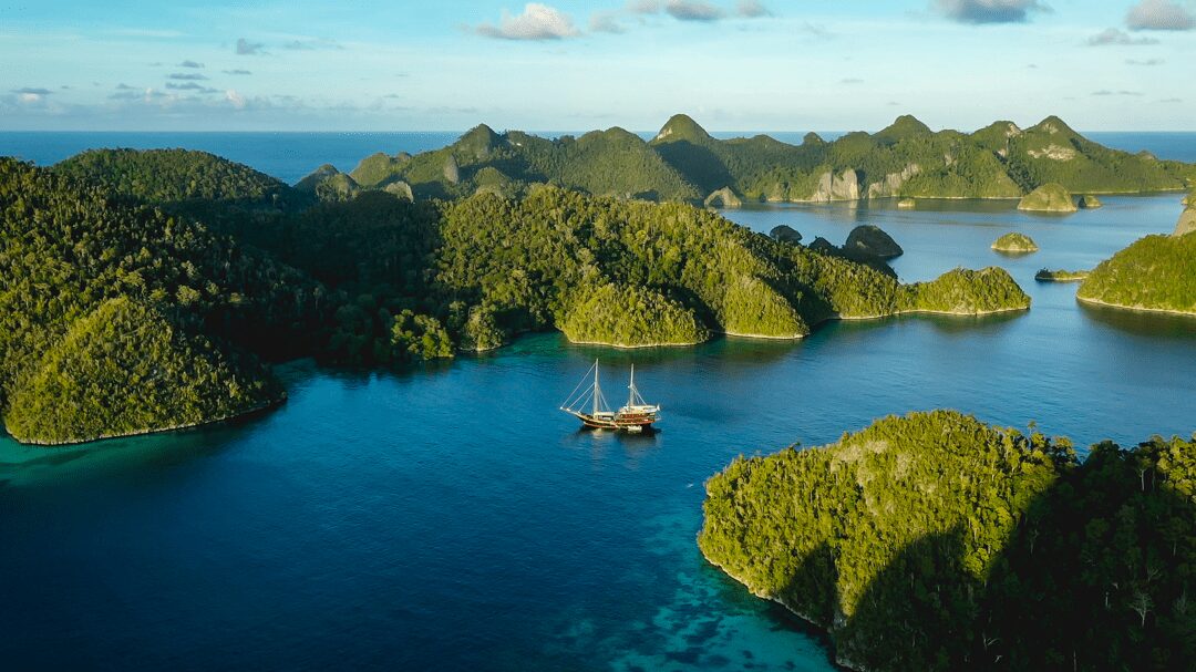 Sailing yacht Sequoia cruising through Indonesian archipelago