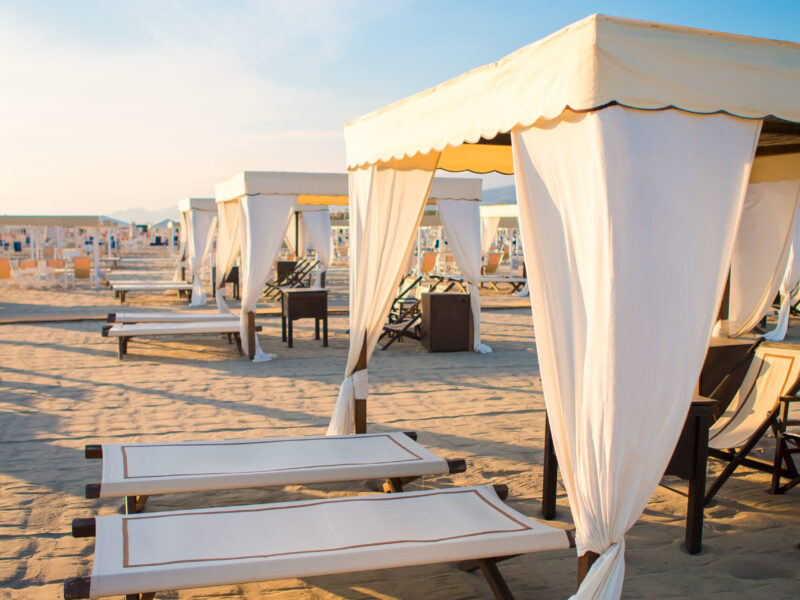 Wooden,Sunbeds,In,Front,Of,A,Turquoise,Sea,In,The