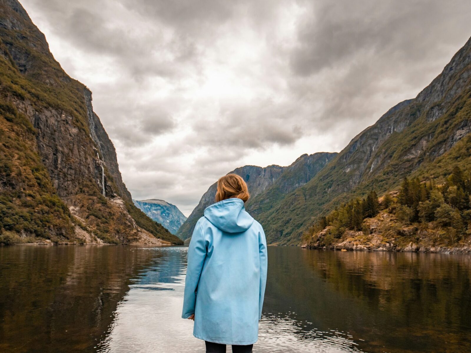 norway fjords yacht charter gemma fottles girl stood looking out