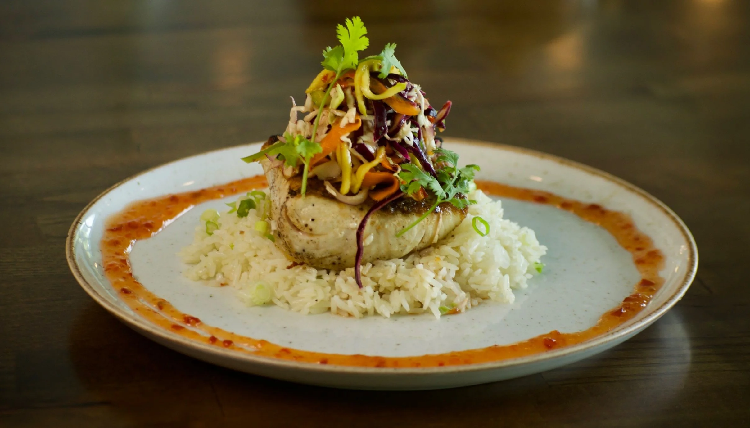 Close up of fish and rice dish at Flying Fish Restaurant, Bahamas