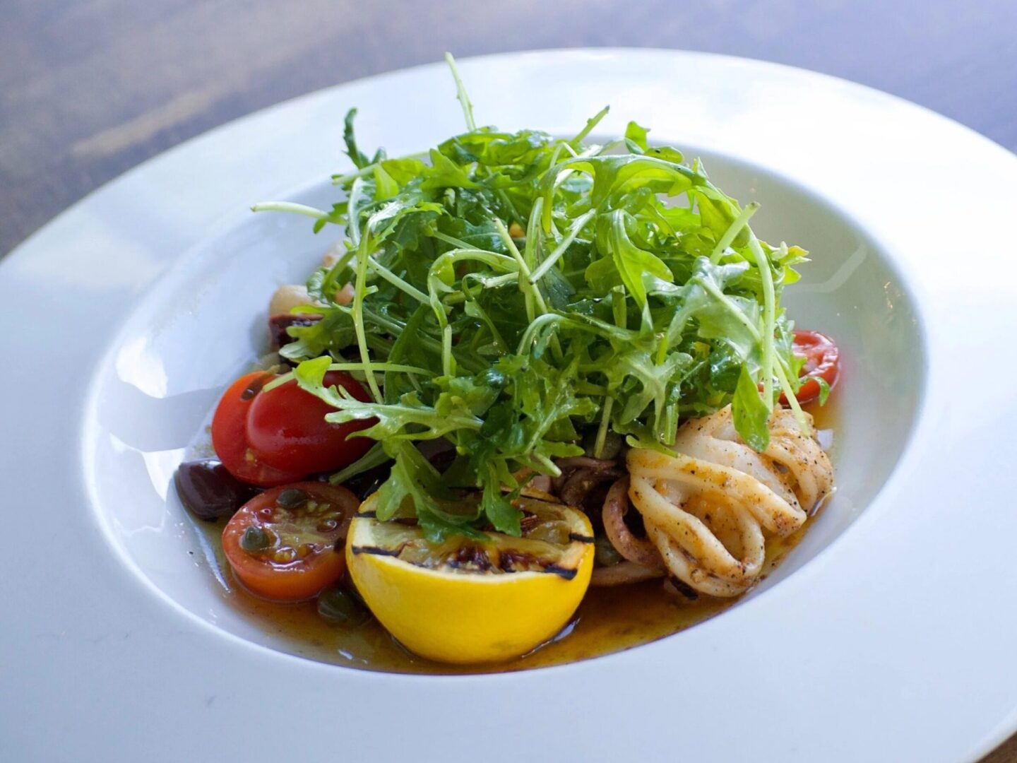Close up of squid dish at Flying Fish restaurant, Freeport