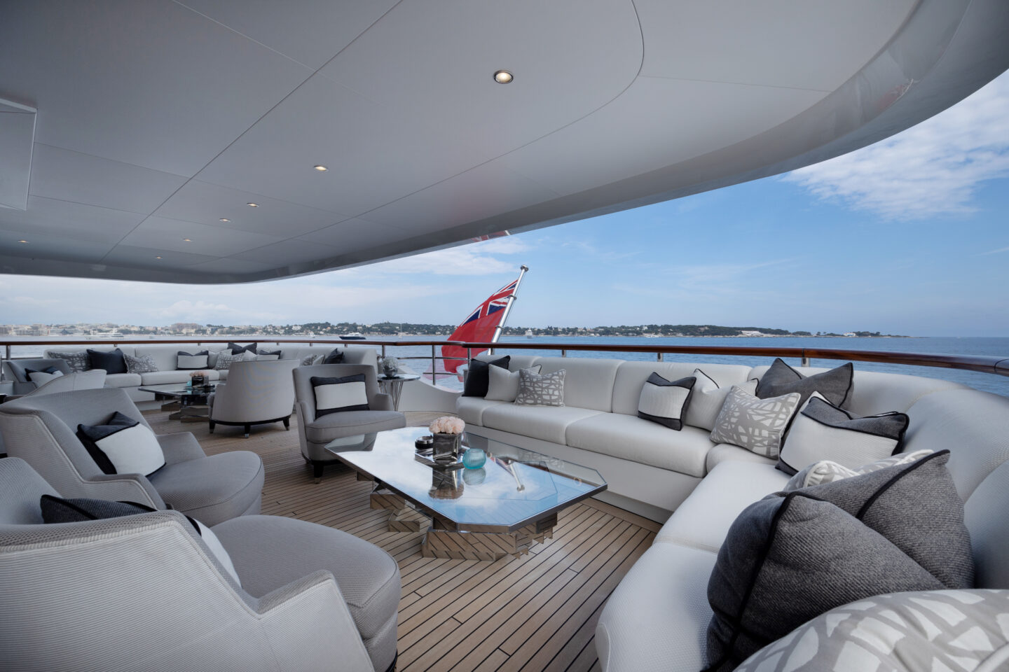 M/Y Soundwave for charter upper deck salon with contemporary lounge seating and panoramic views. Credit: Roccabella / Malcorps.